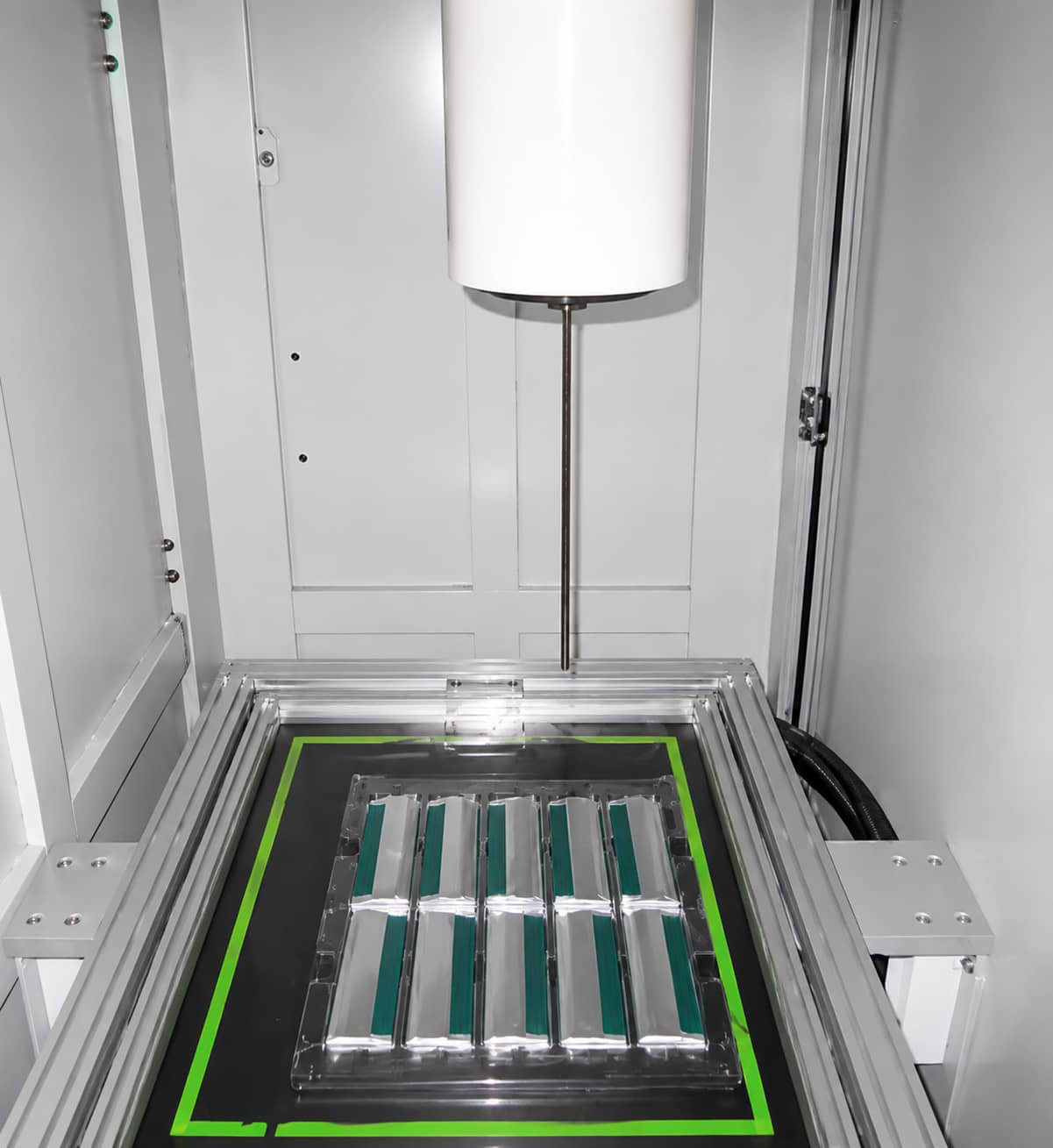 Non-destructive X-ray inspection of pouch cells verifying electrode stacking alignment and rejecting cells with unqualified overhang.