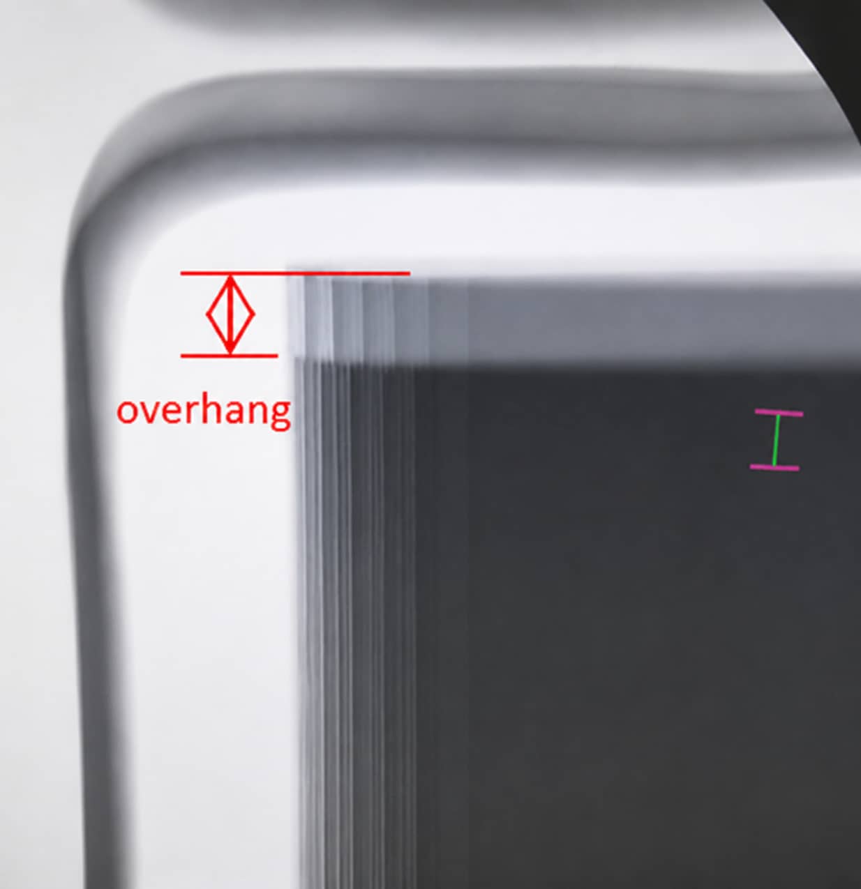 X-ray analysis of lithium-ion battery electrode alignment showing cathode and anode overhang measurement for pouch cell quality control.
